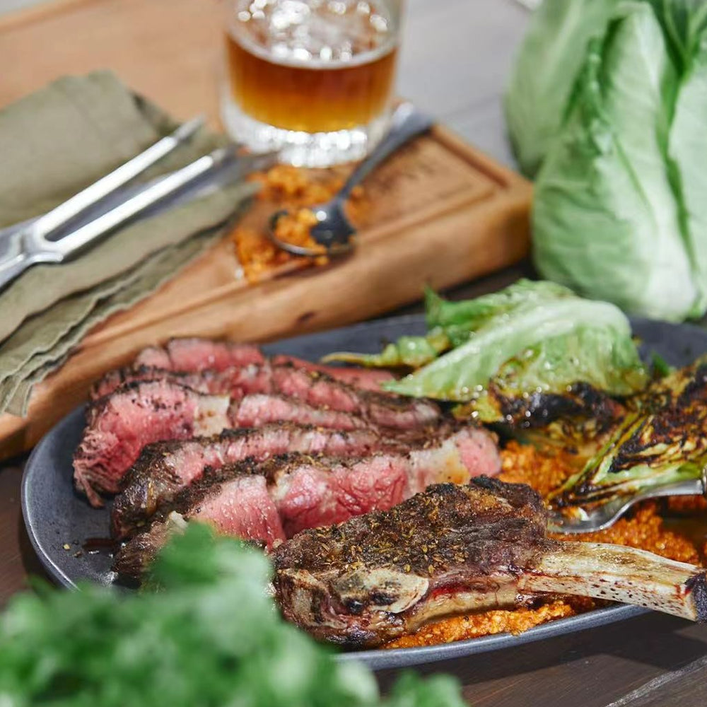 Fennel and Sumac Crusted Rib-Eye with Romesco and Grilled Baby Cabbage